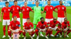England team pose before a game