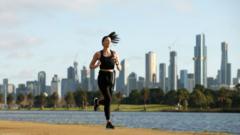 A young woman exercises in Melbourne, Australia