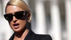 Actress and model Paris Hilton speaks during a news conference outside the U.S. Capitol October