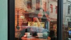 Berna Akdeniz sitting in a cafe