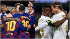 Barcelona and Real Madrid players celebrate