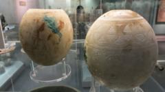 Two ostrich eggs found in the 'Isis tomb', an elite burial at Etruscan Vulci (Italy), dated to c. 625–550 BC