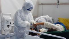 Health care worker treats a patient in Tunisia