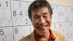 Japanese puzzle manufacturer Maki Kaji poses for a picture during the Sudoku first national competition in Sao Paulo, Brazil, on 29 September 2012
