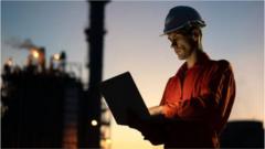 oil worker with laptop