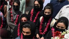Women footballers arrive in Pakistan