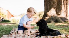 Prince George playing with his dog Lupo