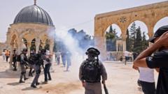 Israeli security forces and Palestinians clash at Jerusalem's al-Aqsa mosque compound