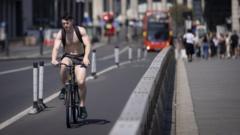 A topless cyclist in London