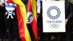 The Ugandan flag alongside the Tokyo 2020 Olympics logo