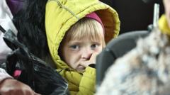 Thousands flee Russian offensive in Kharkiv region