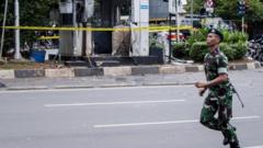 Jakarta Attacks: IS Bombmaker Smiles After 10-year Sentence - BBC News