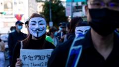 A protester wears Vendetta mask during the march to demand the release of 12 Hong Kong detainees in Taipei, Taiwan, on October 25, 2020.