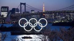 Tokyo Olympic rings lit up at night