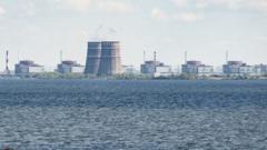 A general view shows the Zaporizhzhia nuclear power plant, situated in the Russian-controlled area of Enerhodar, seen from Nikopol in April 2022