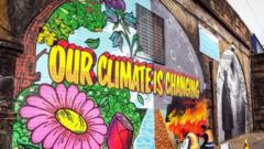 graffiti reading our climate is changing