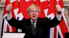 Boris Johnson celebrates signing the trade deal