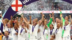 England's Ellen White lifts the trophy as she celebrates with teammates after winning the Women's Euro 2022- Wembley Stadium, London, Britain - July 31, 2022