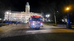 A firefighter truck is parked in front of the National Assembly of Quebec, in Quebec City, early on 1 November, 2020.