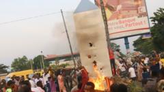 Residents set fire to the mysterious monolith that appeared in Kinshasa, Democratic Republic of Congo - 17 February 2021
