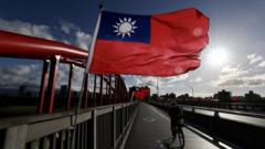 People drive past Taiwan flags installation ahead of National Day celebrations in Taipei, Taiwan, 06 October 2021. On 05 October,