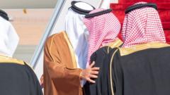 Qatar's Emir Sheikh Tamim bin Hamad Al Thani is greeted by Saudi Crown Prince Mohammed bin Salman on arrival in al-Ula, Saudi Arabia (5 January 2021)