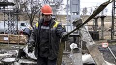 Worker repairs infrastructure in a power station in Ukraine that was damaged by a Russian air attack.