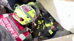 Emergency services pull boy from rubble