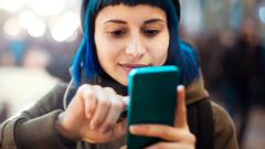 Stock image of a woman using a smartphone
