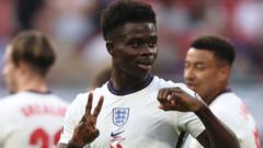 Bukayo Saka celebrates scoring for England against Andorra in a World Cup qualifying match