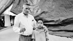 Edwardo Benavides, 40 and his son Jonathon Benavides Reyes, 9, migrants from La Union, El Salvador