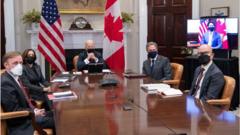 Mr Trudeau, far right, appears on screen during the virtual meeting