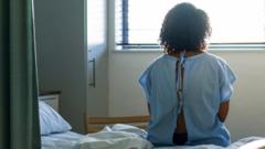 A file image of a woman in a hospital gown