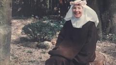 Sister Mary Joseph in her nun's habit with a flower crown