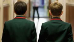 Two school children in uniform