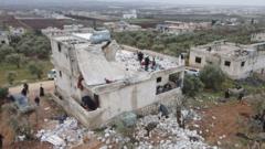 A damaged building is seen after a US special forces raid in Atmeh, Syria (3 February 2022)