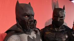 Batman impersonators at a premier for the film The Batman in London (23 February 2022)