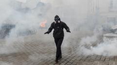 In Pictures: French Workers Strike Over Pension Reforms - BBC News