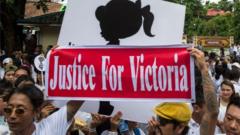 Protesters take part in a demonstration demanding justice for a two-year-old who was raped and given the pseudonym "Victoria" in front of the Central Investigation Department (CID) in Yangon on July 6, 2019.