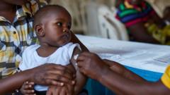 Child vaccinated against malaria