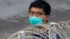 Pro-democracy activist Joshua Wong is seen in Lai Chi Kok Reception Centre after jailed for unauthorised assembly near the police headquarters during last year"s anti-government protests in Hong Kong, China December 3, 2020.