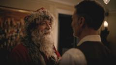 A still image shows a frame from a video commercial for the Norwegian postal service "When Harry Met Santa", which features a gay Santa Claus