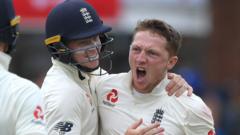 Dom Bess celebrates a wicket