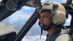 Mohammad Edris Momand flying his helicopter above Afghanistan