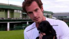 Andy Murray with a puppy