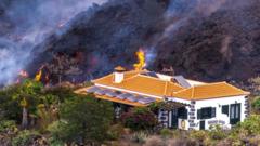 Home spared from the lava flow after a volcanic eruption on the Canary Island of La Palma, Spain