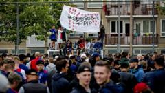 Ajax fans rally for stricken player Abdelhak Nouri - BBC News