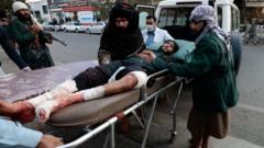 A Taliban fighter, injured during a blast, is pictured at the entrance of a hospital in Kabul, Afghanistan November 2, 2021.