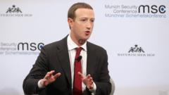 Facebook founder and CEO Mark Zuckerberg speaks during a panel talk