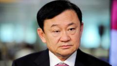 Former Thai PM Thaksin to face royal insult charges